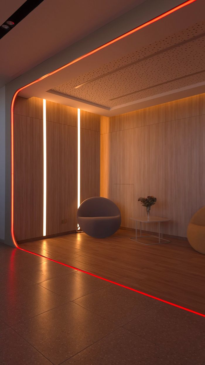 Mastering the First Impression: Your intriguing post title goes here A stylish lobby area featuring ambient lighting and contemporary decor, providing a warm and inviting atmosphere.